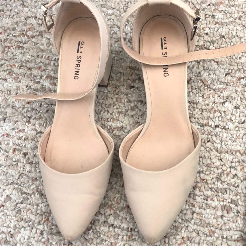 Slightly worn mini heel dress shoe